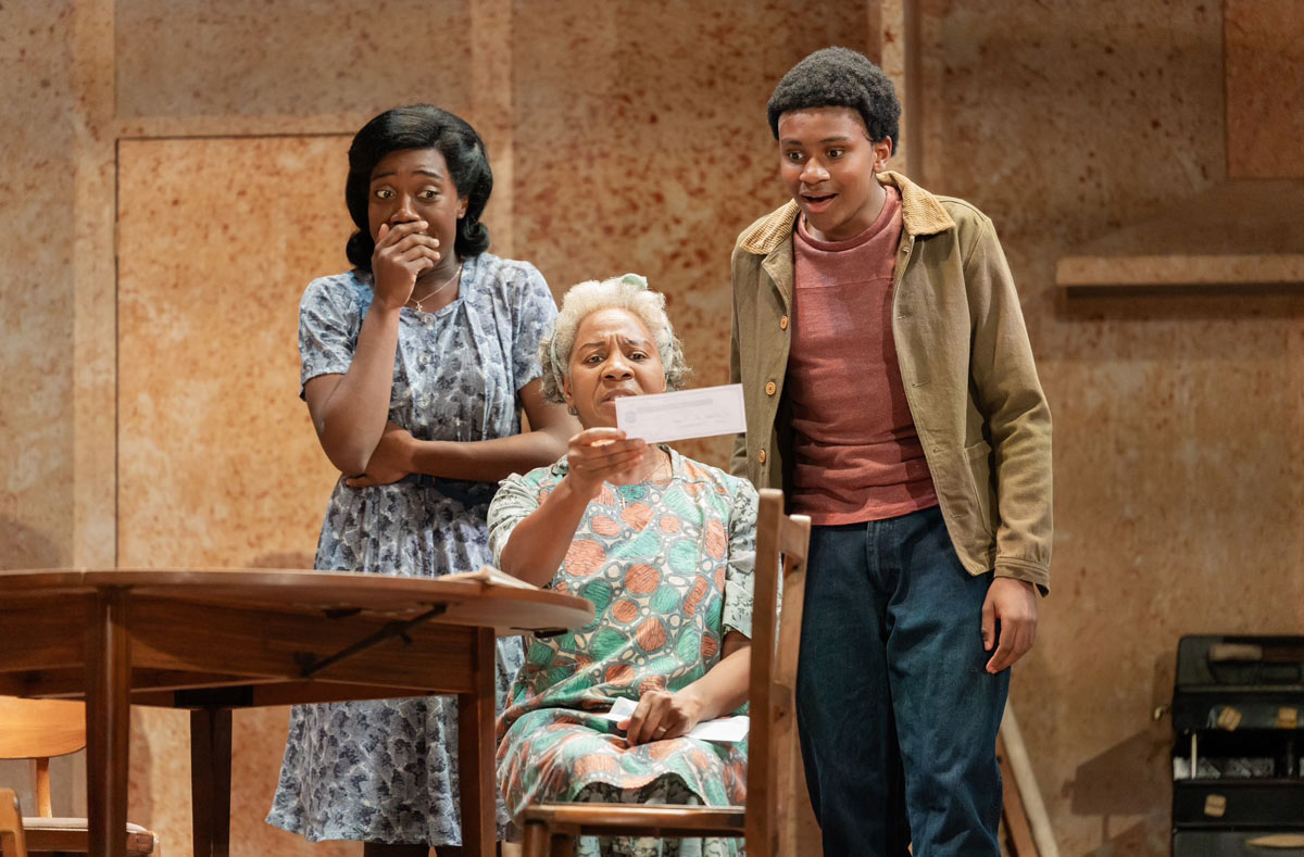 Cash Holland, Doreene Blackstock, and Adiel Magaji in A Raisin in the Sun at the Lyric Hammersmith - Photo credit Ikin Yum